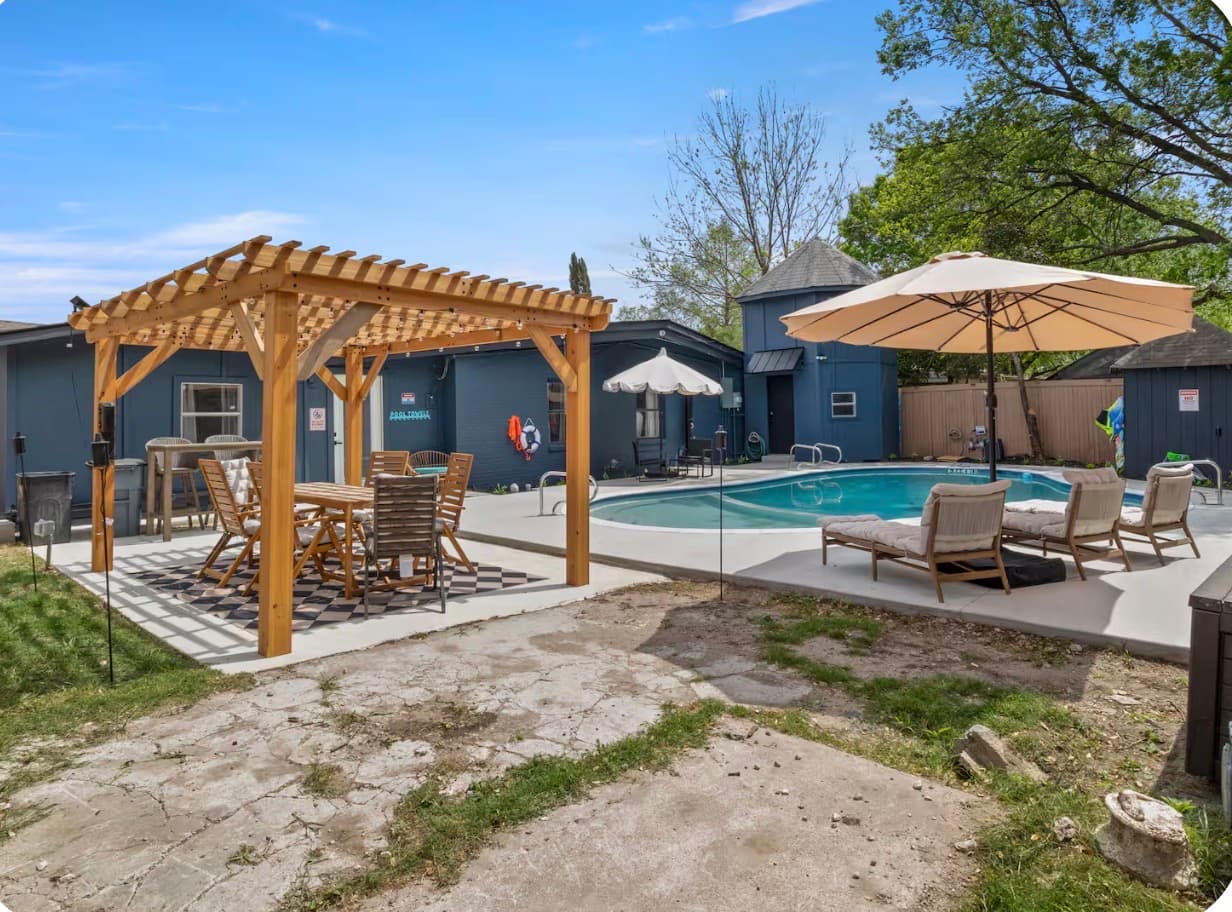 Outdoor pool and covered patio at the Dallas Creative Connect location.